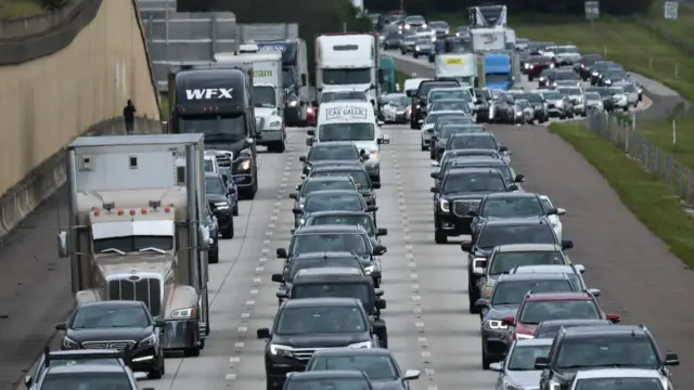 Traffic moves slowly on the I-4 highway as Tampa Bay residents evacuate