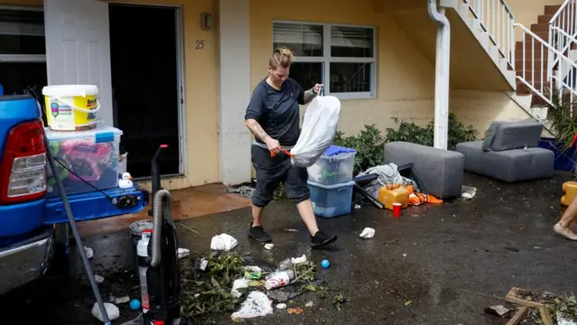 A person cleaning a house