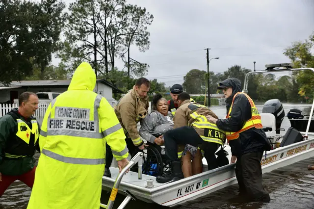 Officials rescuing people and pets