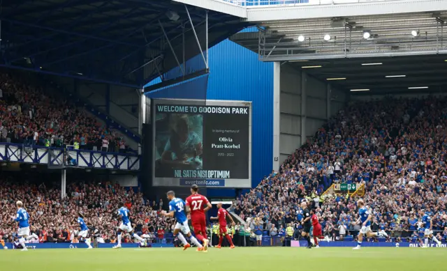 Tribute on pitchside screen to Olivia Platt-Korbel