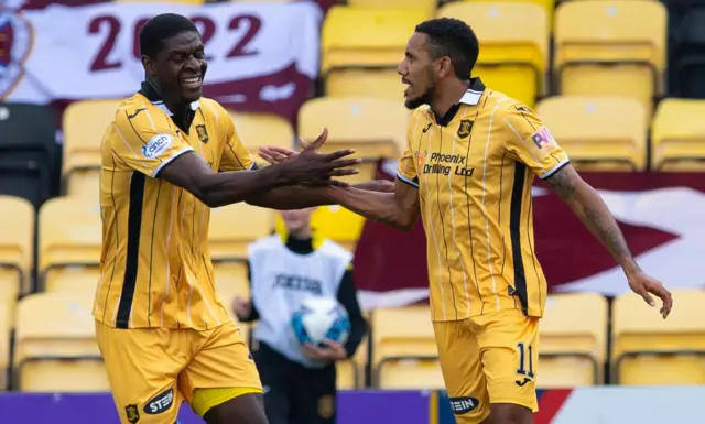 Christian Montano (right) celebrates his goal with Joel Nouble