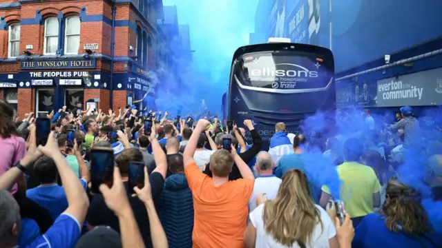 Everton fans greet team bus