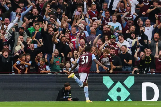 Leon bailey celebrates with Villa fans