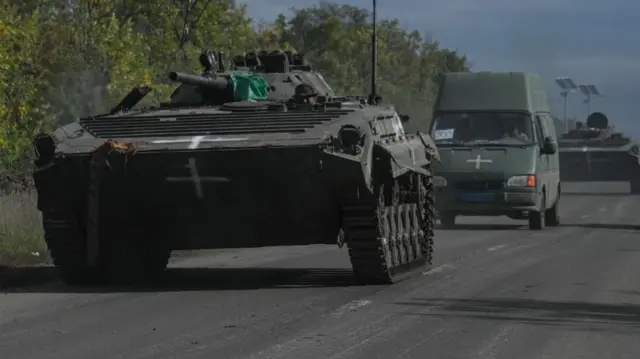 Ukrainian soldiers ride a tank in Donetsk region on September 25, 2022, amid the Russian invasion of Ukraine