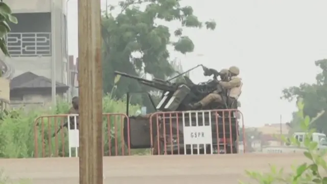 Soldiers in a military vehicle