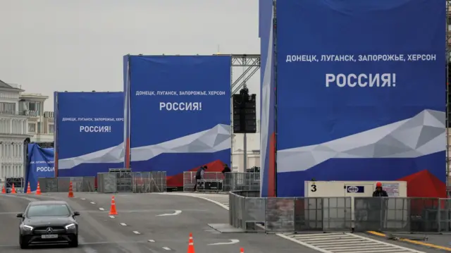 Banners and screens are being put up near Red Square