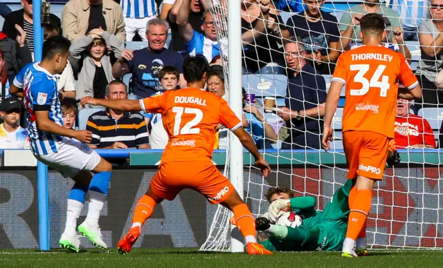 Dan Grimshaw saves for Blackpool