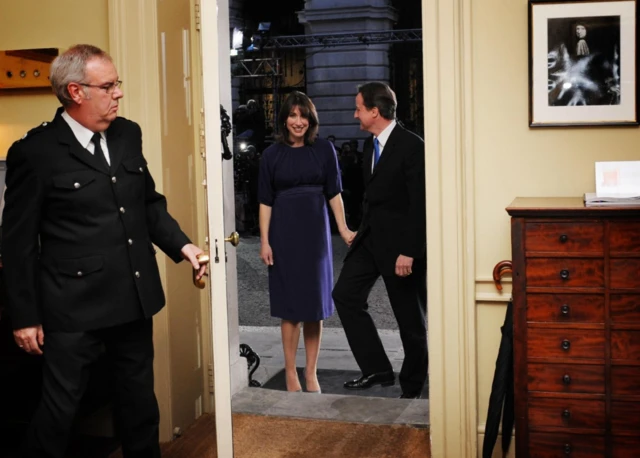 David Cameron and Samantha Cameron walk through Number 10 after being made prime minister