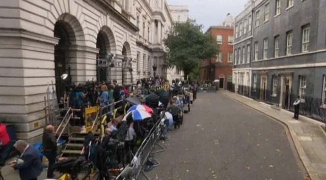 The media gathered opposite No 10 Downing Street