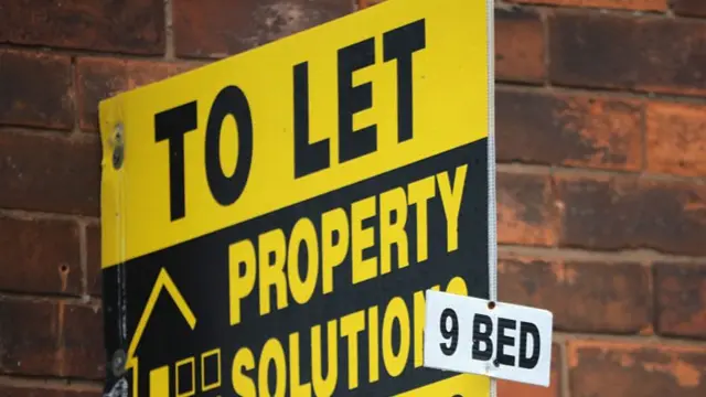 A sign showing property to let