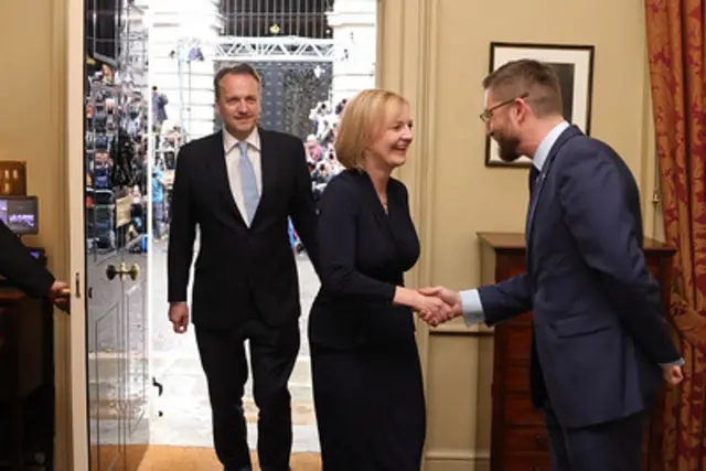 Prime Minister Liz Truss greeted as she enters Downing Street