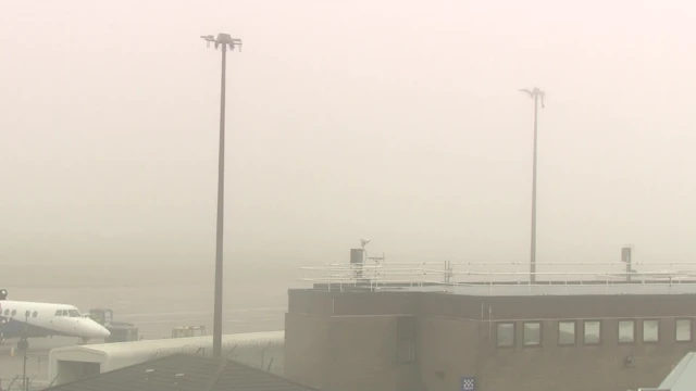 Foggy Aberdeen airport runway