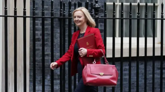 Liz Truss leaving Downing Street, London, after attending a Cabinet meeting.