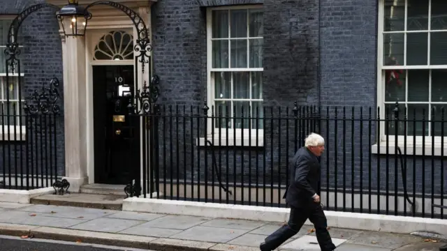 Boris Johnson leaves Downing Street