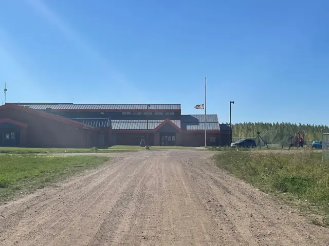 Photo of gravel road into James Smith Cree Nation