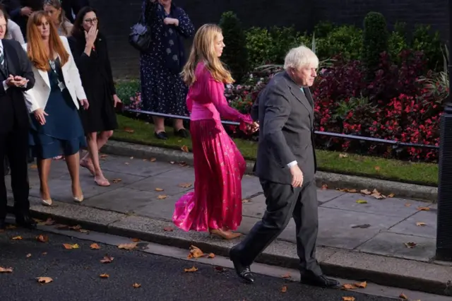 Boris Johnson and his wife Carrie leave Downing Street