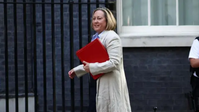 Anne-Marie Trevelyan walks outside Downing Street in London