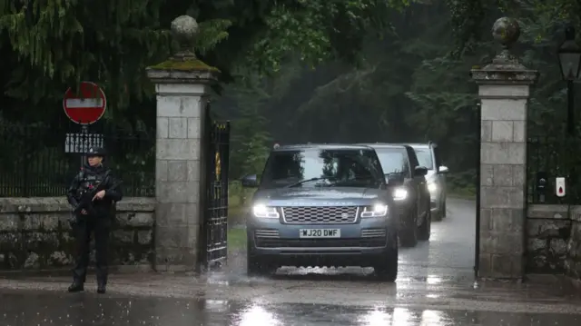 Cars leaving Balmoral Castle