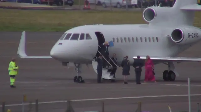 Boris and Carrie Johnson getting off a plane at RAF Northolt