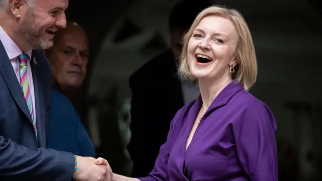 British Member of Parliament and Conservative Party Co-Chair Andrew Stephenson (L) congratulates new Conservative Party Leader Liz Truss (R) following the announcement of her win at Conservative Central Office, London,