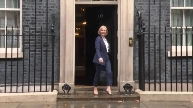 Liz Truss walks out the No10 door