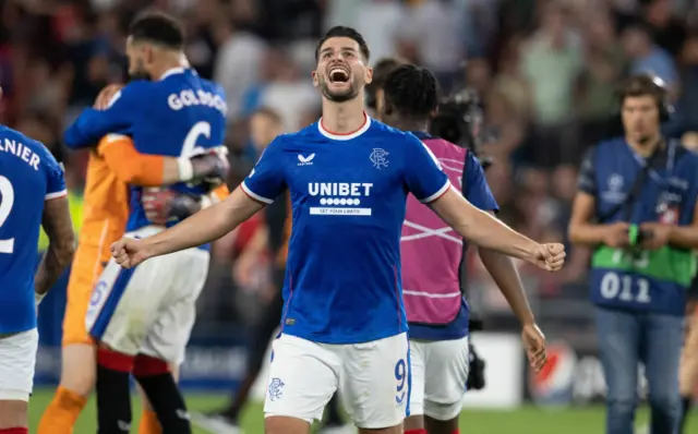 Antonio Colak celebrates at full-time after the play-off win at PSV