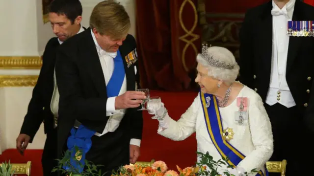 Queen Elizabeth II makes a toast alongside King Willem-Alexander of The Netherlands during a State Banquet to mark the state visit of King Willem-Alexander of The Netherlands and Queen Maxima of The Netherlands at Buckingham Palace on October 23, 2018 in London, United Kingdom.