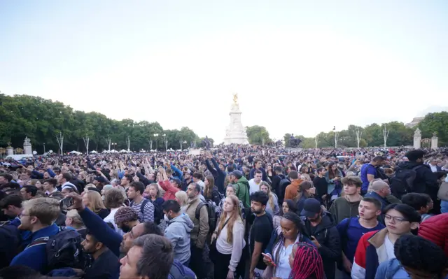 Crowd gathered near Buckingham Palace after announcement of death of Queen Elizabeth II