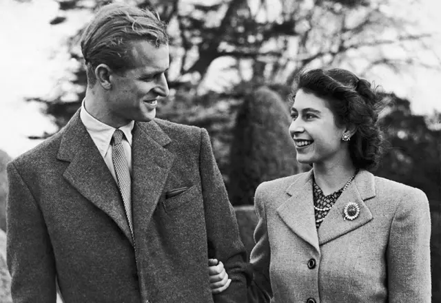 Princess Elizabeth and the Duke of Edinburgh arm in arm. 28 November 1947