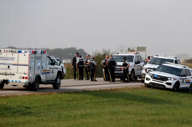 Ambulance at scene of arrest. Suspect is believed to be dead.