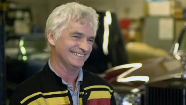 Fred Budd smiles at the camera