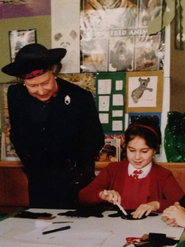 Becky Kluth showing the Queen her puppet-making skills in 1994