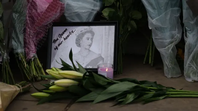 A picture of the Queen with a note saying 'The Queen of our Hearts'