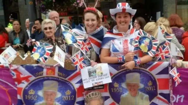 Kelly Ann Martin (on the right) welcoming the Queen to Leeds