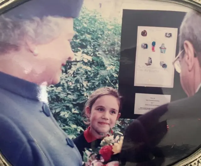 Samantha Armstrong smiles as she meets the Queen