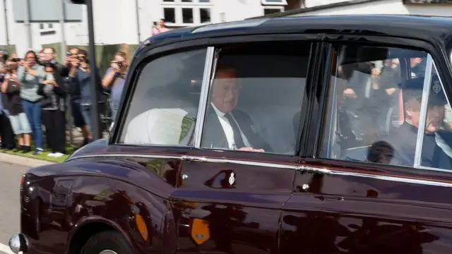 King Charles being driven away from RAF Northolt in a royal limousine