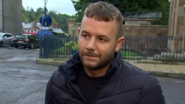 Colin McCrory, from the Shankill area of Belfast, travelled to Hillsborough to pay his respects