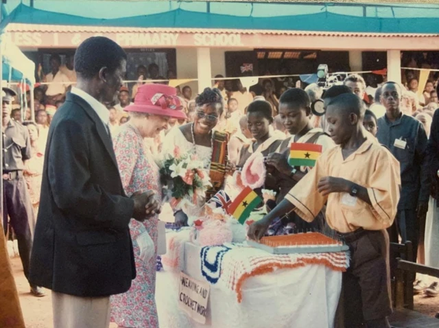 Monica Simpson meeting the Queen in Ghana