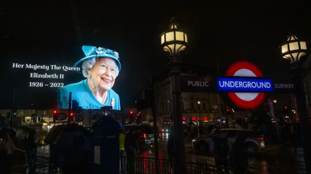 The advertising screens in Piccadilly Circus display an image of Queen Elizabeth II on September 08, 2022 in London, England