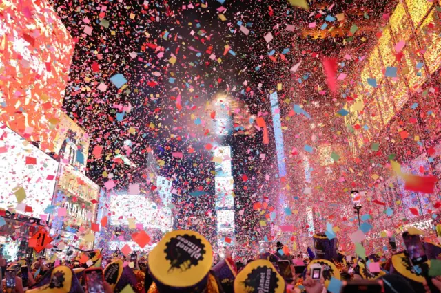 Confetti fills the air