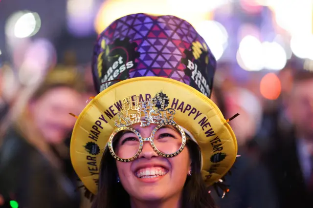 Reveller in new year attire