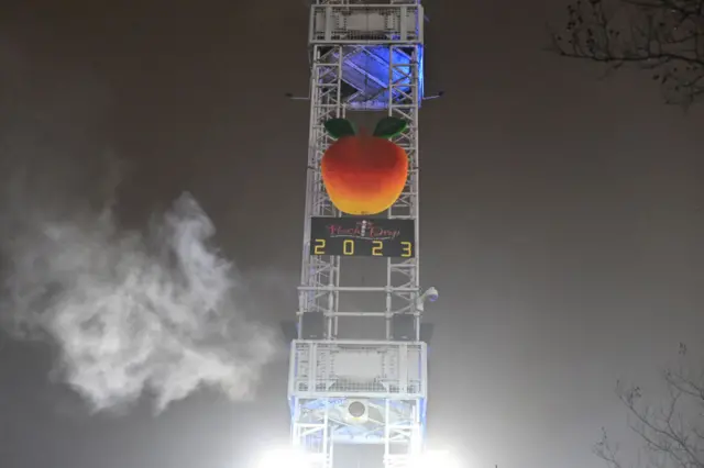 A general view of the peach drop during the Peach Drop 2023 celebration at Underground Atlanta on 1 January 2023 in Atlanta, Georgia