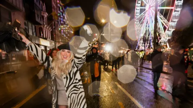 Revellers celebrate ahead of the New Year, in Edinburgh, Scotland, Britain December 31, 2022. REUTERS/Russell Cheyne