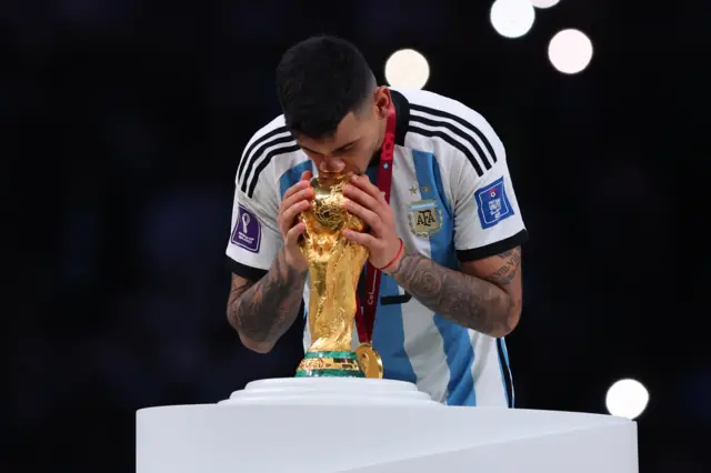 Cristian Romero kisses World Cup