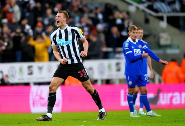 Dan Burn celebrates scoring for Newcastle