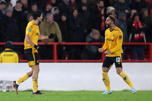 Raul Jimenez and Matheus Cunha celebrate