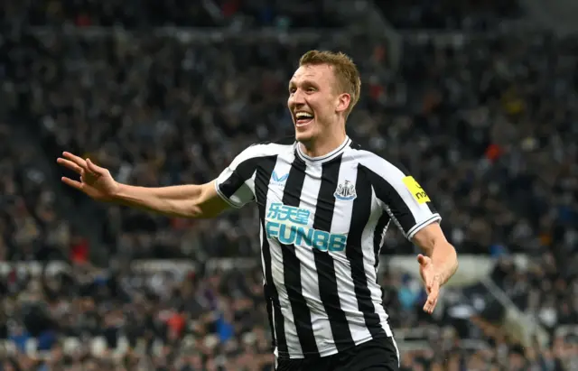 Dan Burn celebrates a goal for Newcastle against Leicester