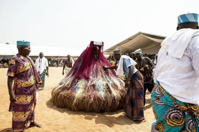 Voodoo followers attend the voodoo festival in Ouidah, Benin