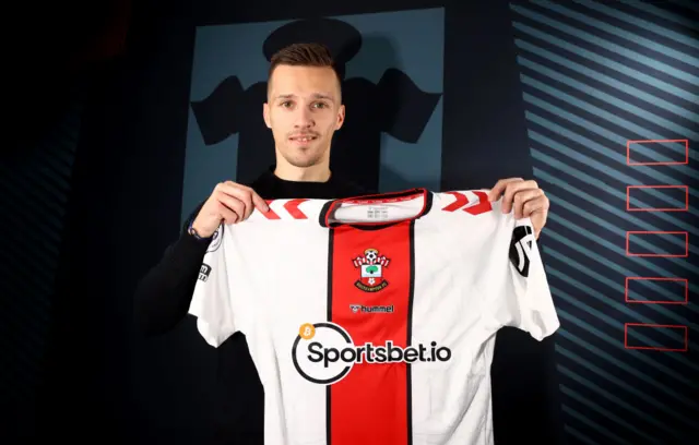 Mislav Orsic holding up a Southampton shirt