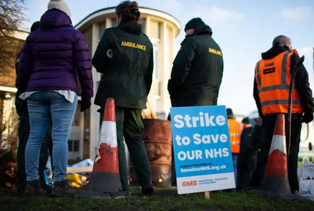 Striking ambulance workers picket outside Huddersfield Ambulance Station in Huddersfield